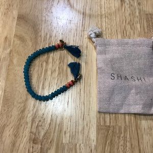 Shashi Joe Clasp turquoise, coral accent bracelet